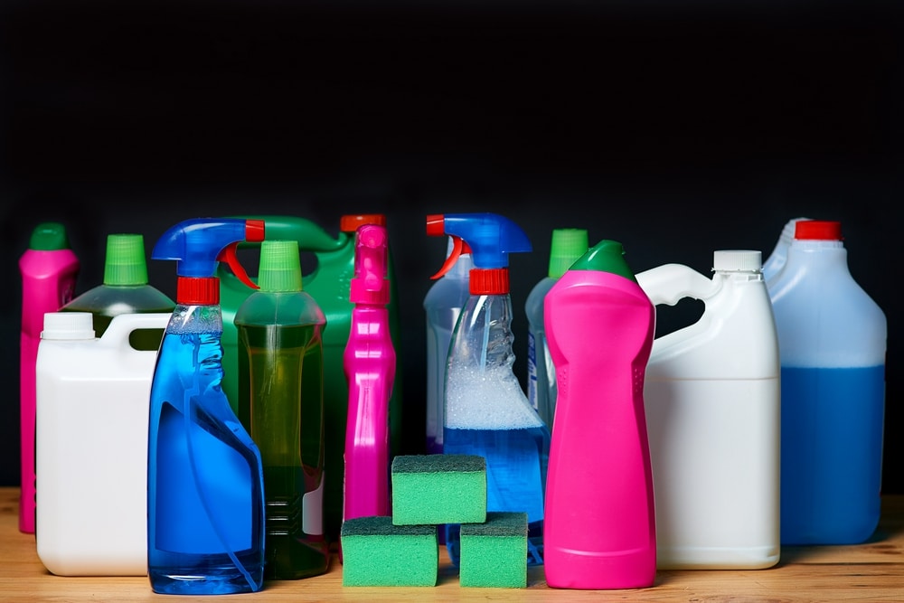 Cleaning equipment. Shot of various bottles of detergents isolated on black